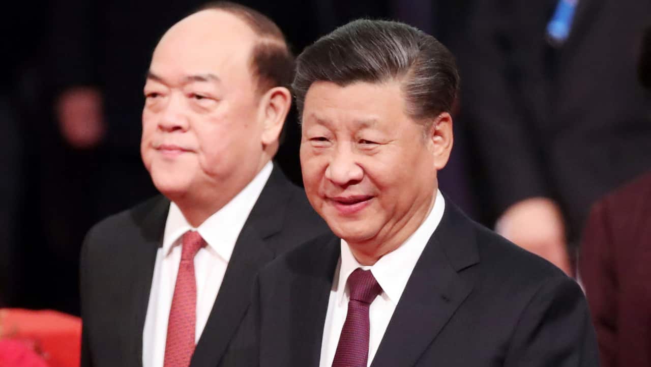 Chinese President Xi Jinping attends the 20th anniversary of Macau's return to China Ceremony with Chief Executive of Macau Ho Iat Seng.