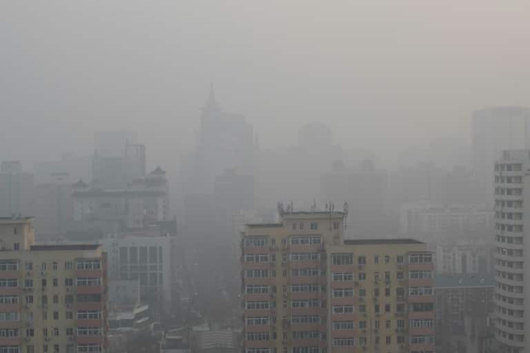 Buildings are barely visible on a polluted day in Beijing in January 2020.