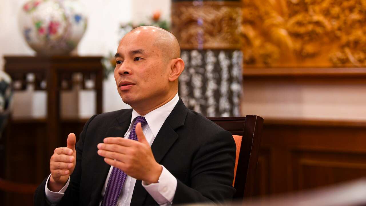 The Deputy Head of Mission of the Chinese Embassy in Australia, Wang Xining.