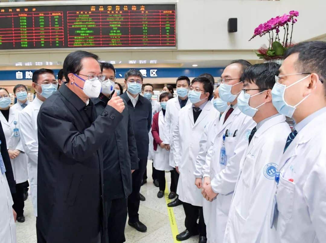 Photos of medical staff in surgical masks greeting officials in specialised N95 respirator masks also fuelled anger over the handling of the outbreak.