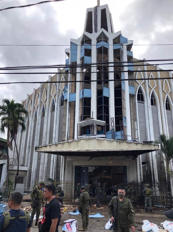 Soldiers guarding a Catholic Church where two bombs exploded in Jolo city, Sulu, Philippines, 27 January 2019. 