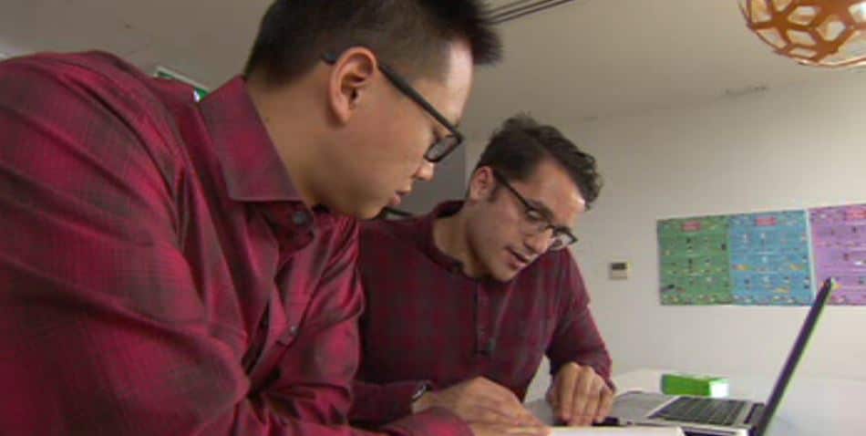 Clark, right, has inspired friend Jenixon Lin to re-learn Mandarin. 