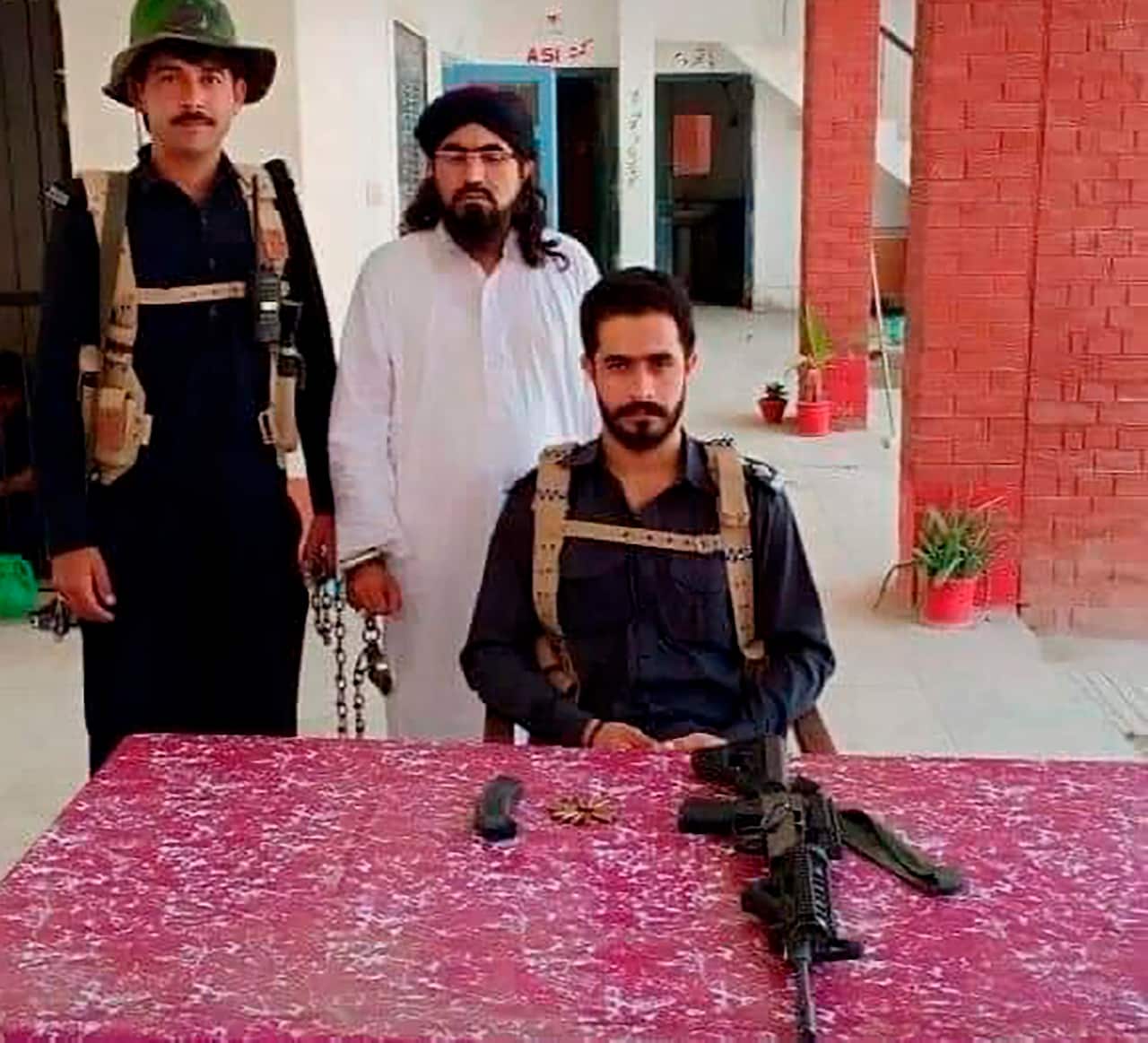 Cleric Mufti Sardar Ali Haqqani pictured after his arrest at a police station in Lakki Marwat, Pakistan.
