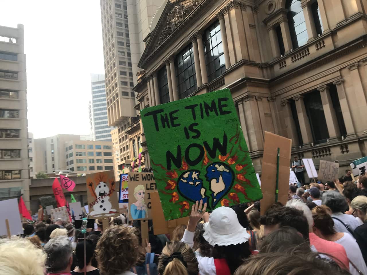 Protesters chanted, "Hey hey, ho ho ScoMo has got to go" as they gathered at Town Hall.