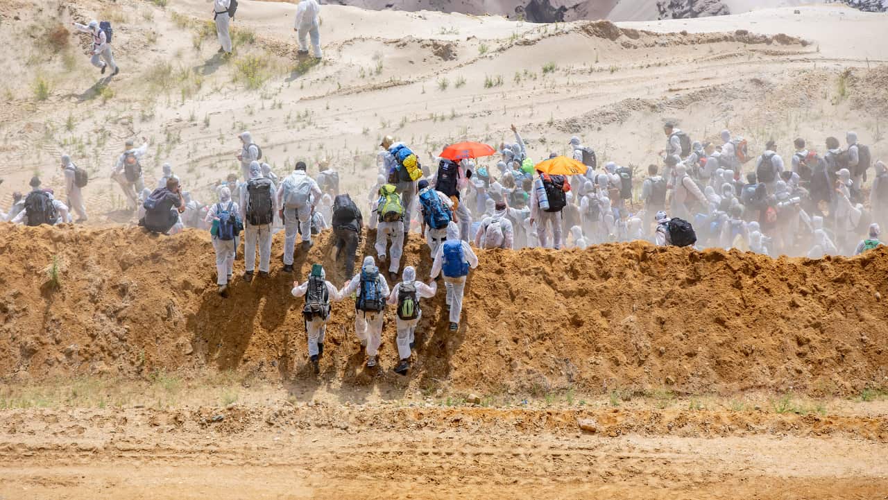Activists climb into the Garzweiler lignite mine.  