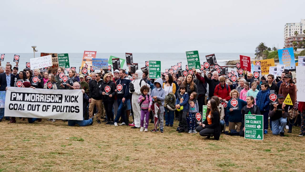 About 500 people gathered in Cronulla Park in Sydney's south to protest against the federal government's refusal to act on climate change.