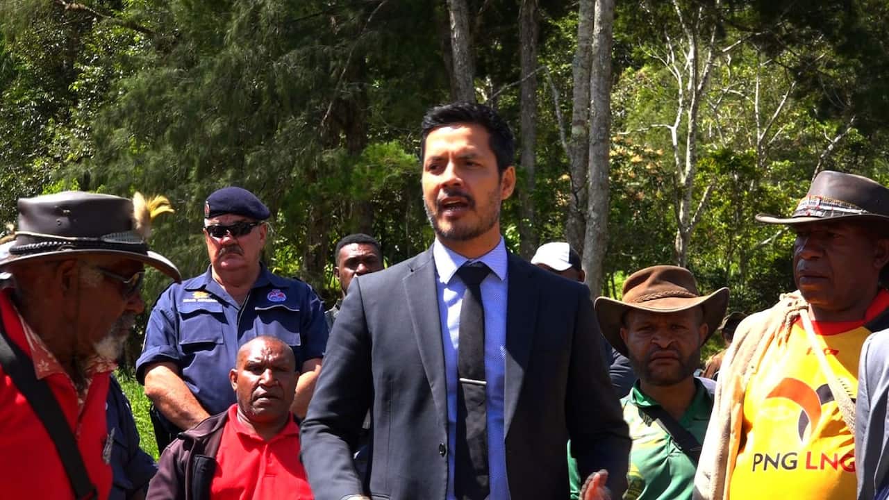 Police minister Bryan Karmer visits Karida village.