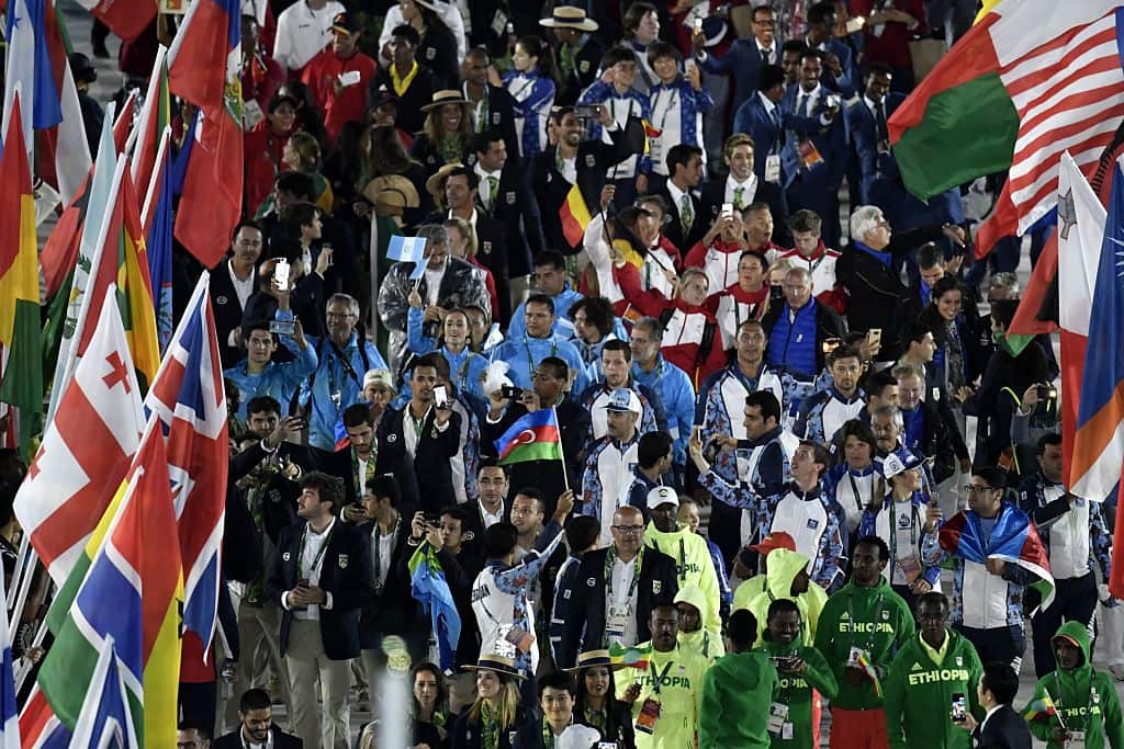 Athletes parade during the closing ceremony of the Rio 2016 Olympic Games at the Maracana stadium in Rio de Janeiro on August 21, 2016. / AFP / PHILIPPE LOPEZ        (Photo credit should read PHILIPPE LOPEZ/AFP/Getty Images)