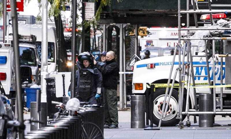 The NYPD Bomb Squad outside the CNN building as officers secure the broadcaster's office, following the discovery of a possible bomb.