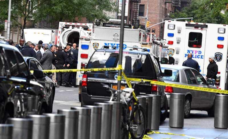 NYPD officers and emergency services outside CNN's New York office.