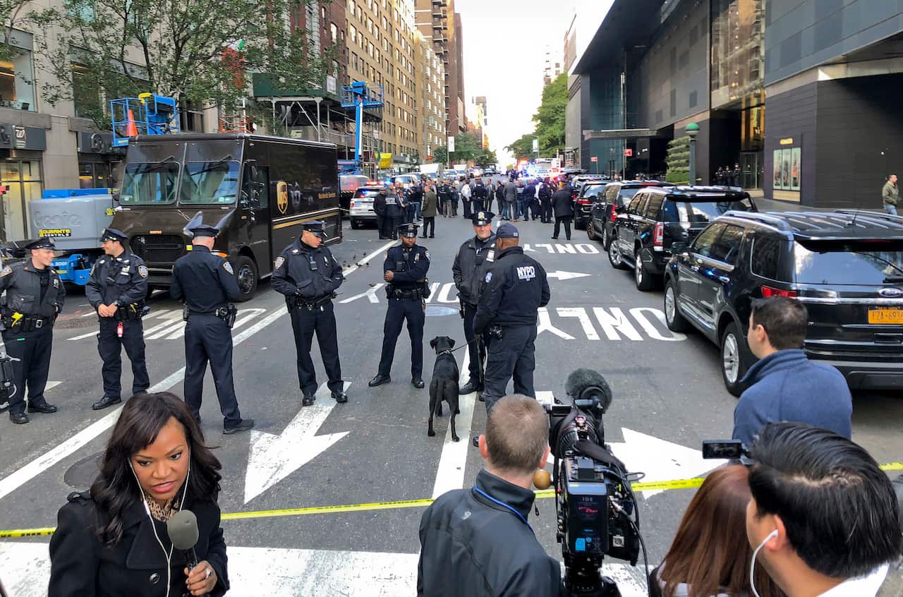 New York Police stand outside the Time Warner Center at Columbus Circle. (AP)
