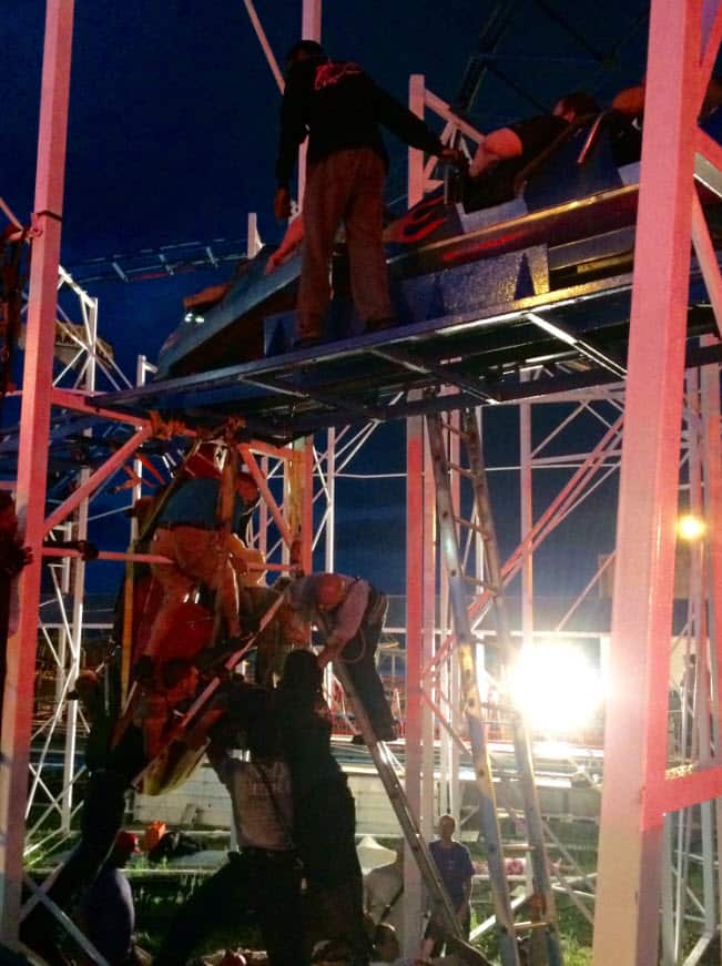 Two riders were left dangling during the incident, according to the fire department.