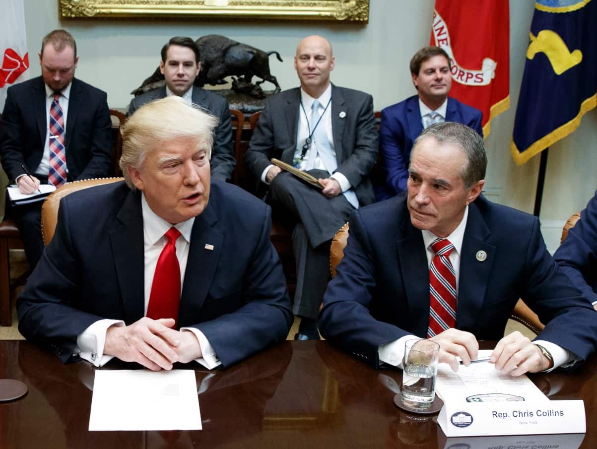 File photo Republican US Rep. Chris Collins of western New York state, right, sits next to President Donald Trump 