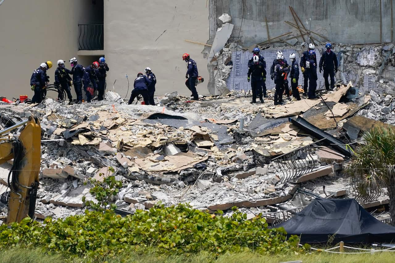 Rescue crews continue to search for signs of life in the partially collapsed Champlain Towers South condo in Surfside, Florida.