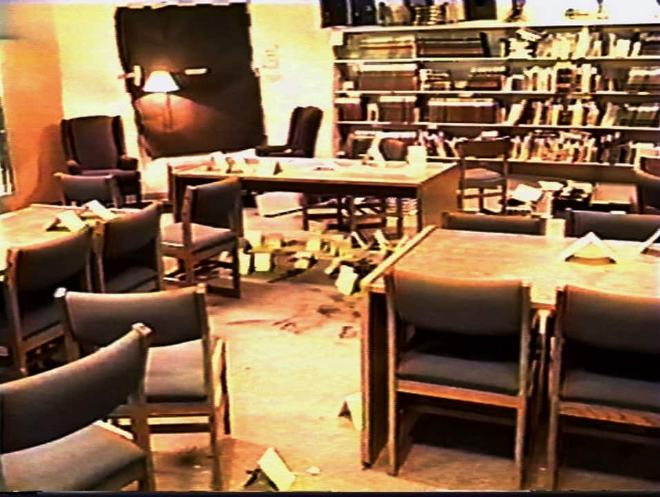 April 1999: Image released by the Jefferson County Sheriff's Dept shows yellow evidence tags in the library at Columbine High School after the shooting.