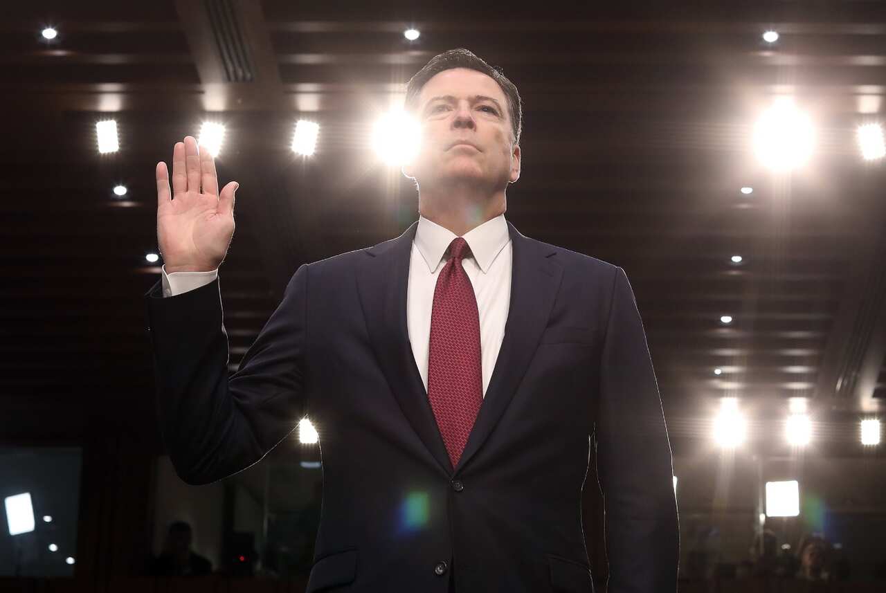 File: Former FBI Director James Comey is sworn in before he delivers his much-anticipated testimony before the Senate Intelligence Committee 