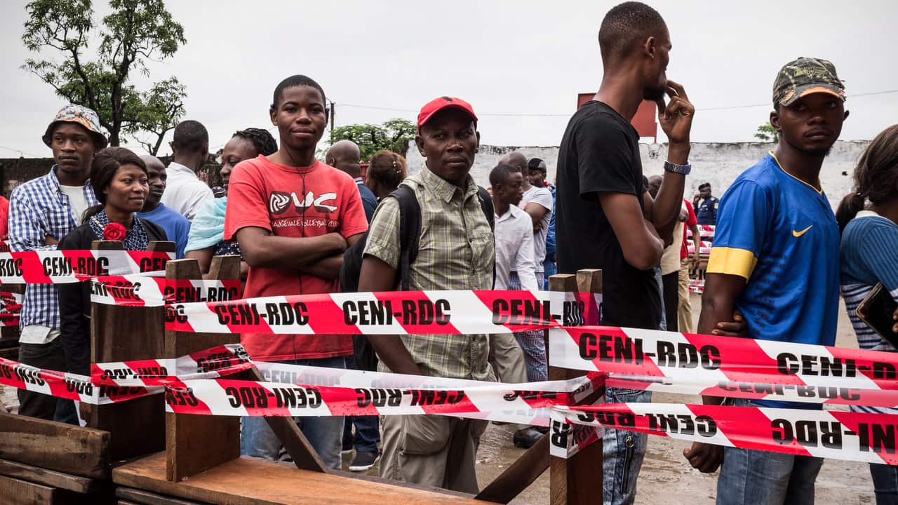 Voters queue to cast their ballots in the general elections in Kinshasa, Democratic Republic of the Congo.