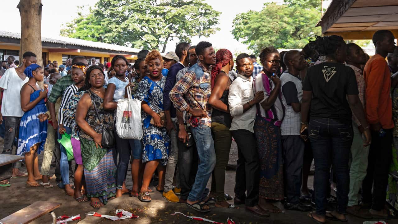 Voters queue to cast their ballots in the general elections in Kinshasa, Democratic Republic of the Congo.
