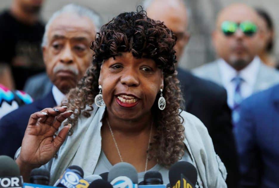 Garner’s mother, Gwen Carr speaks with the media, saying the department of justice had failed her family. 