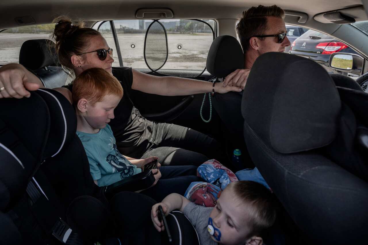 Per Jonsson attends a drive-in church with his family at an industrial wasteland in eastern Copenhagen, May 31, 2020. 