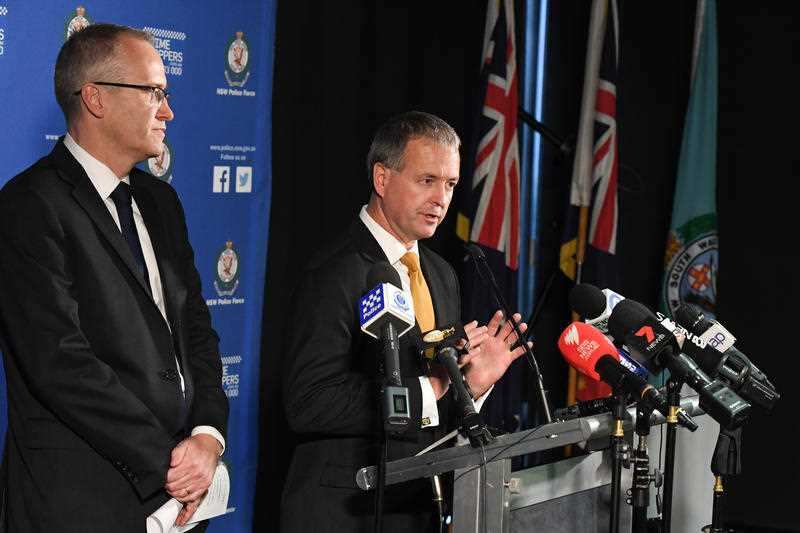 Australian Federal Police Assistant Commissioner Ian McCartney (left) and NSW Police Assistant Commissioner Mick Willing address the media in Sydney.