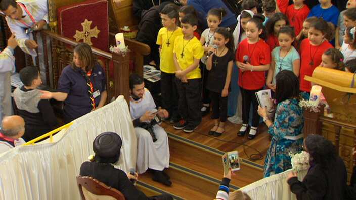 Australian Coptic Christians at a church service in Sydney