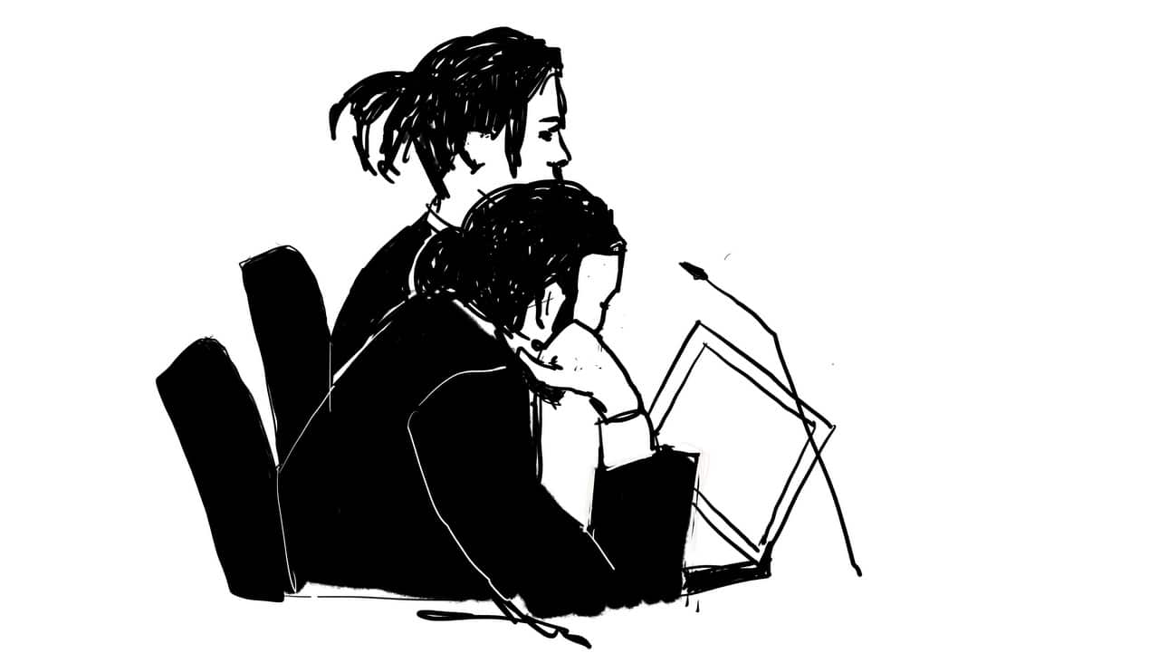 Rakim Athelaston Mayers alias A$AP Rocky (rear) and his defence lawyer Slobodan Jovicic (front) in the district court in Stockholm, Sweden.