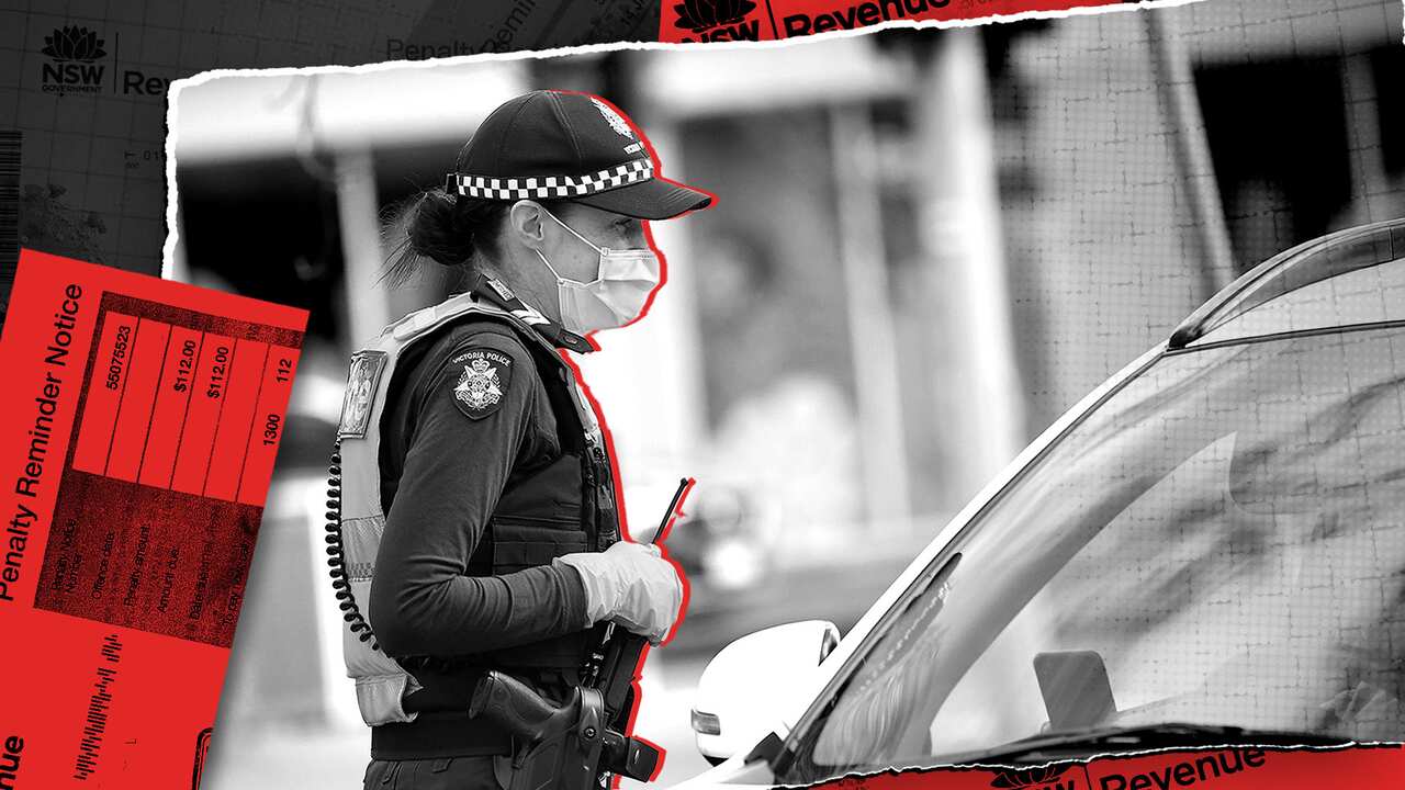 A police officer speaks to an unidentified person. 