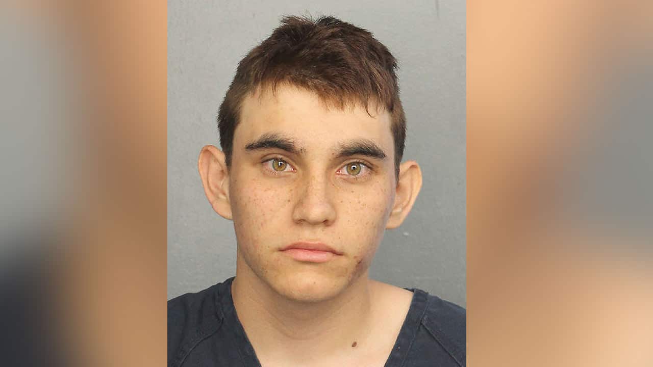 The 19-year-od was questioned by police for hours following the deadliest school shooting in the US in five years.