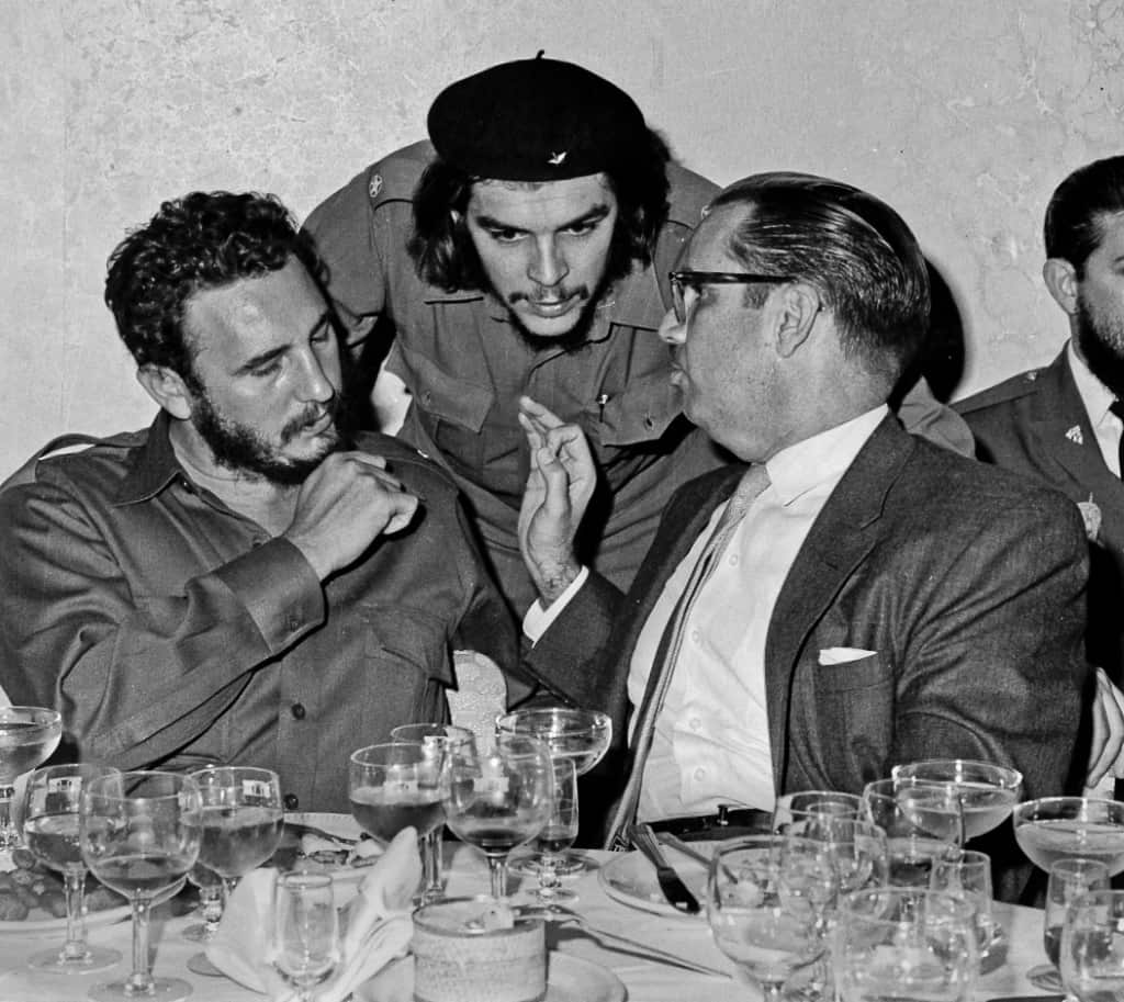 In this 1960 file photo, Cuba's revolutionary hero Ernesto "Che" Guevara, center, Cuba's leader Fidel Castro, left, and Cuba's President Osvaldo Dorticos, right,