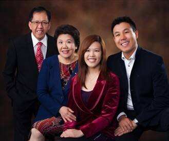 Parramatta shooting victim Curtis Cheng (left) with family. 