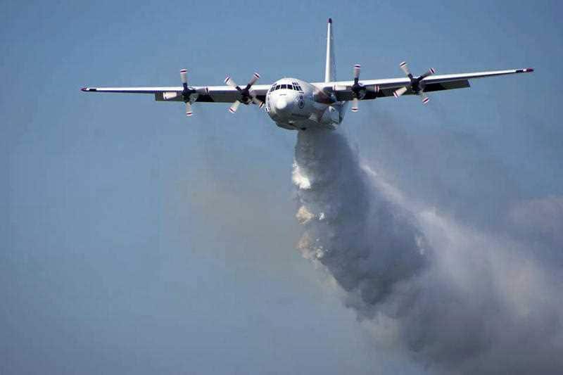 A C-130 Hercules carrying out waterbombing operations. 