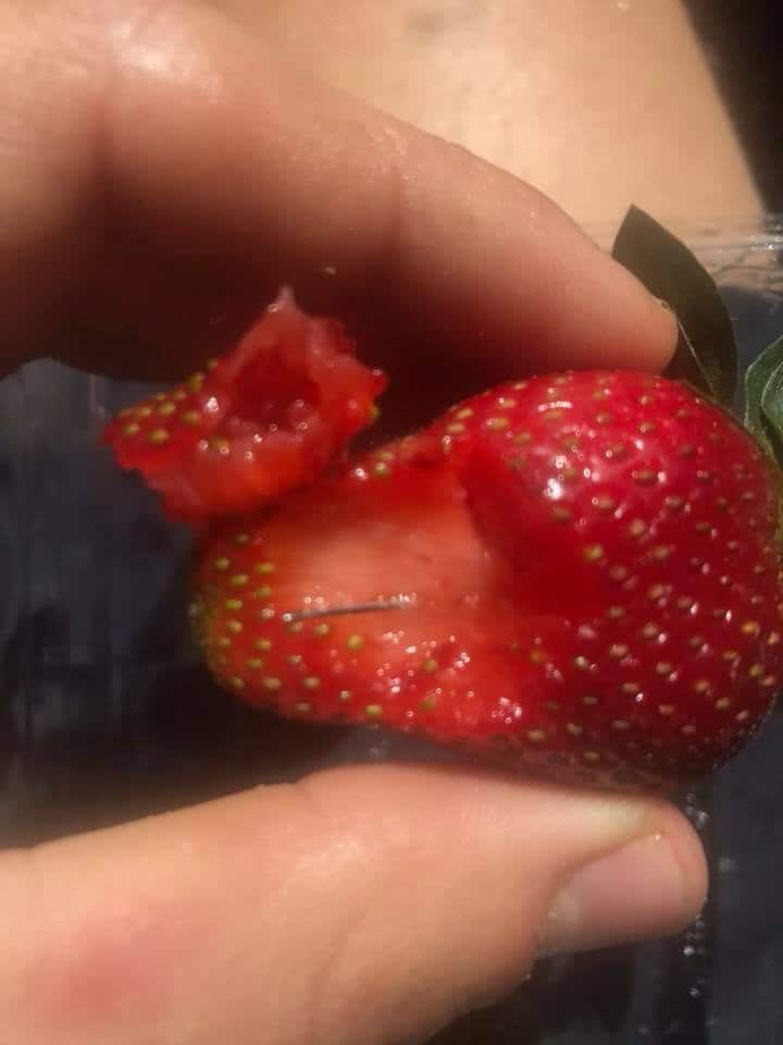 A Queensland man found this needle in his strawberry.