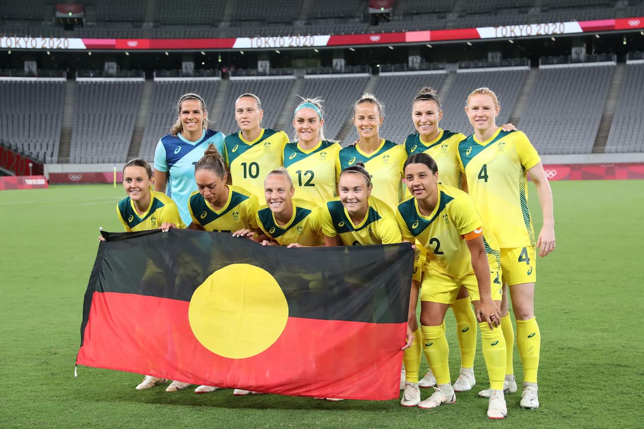 Matildas with Aboriginal Flag at Olympics