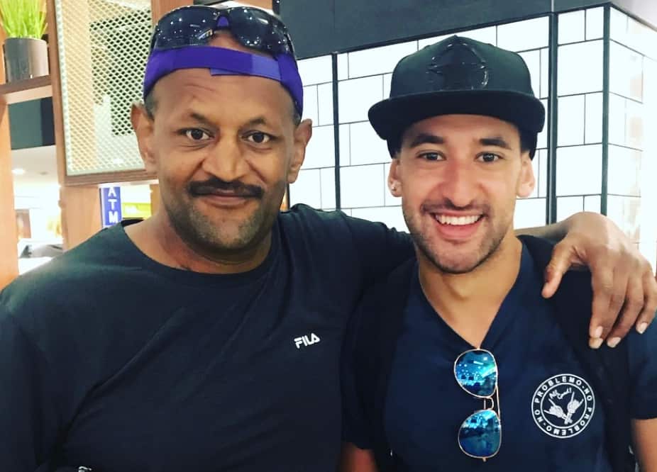 Tainga with his father. 