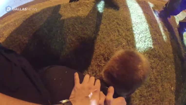 Tony Timpa is pinnefd with his body to the ground.