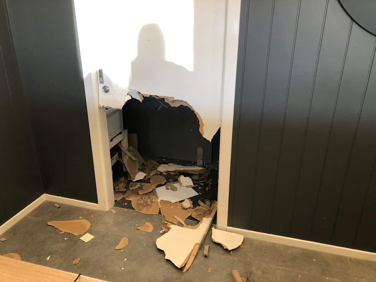 The hole in the door at Kingston's Adobe Hotel. 