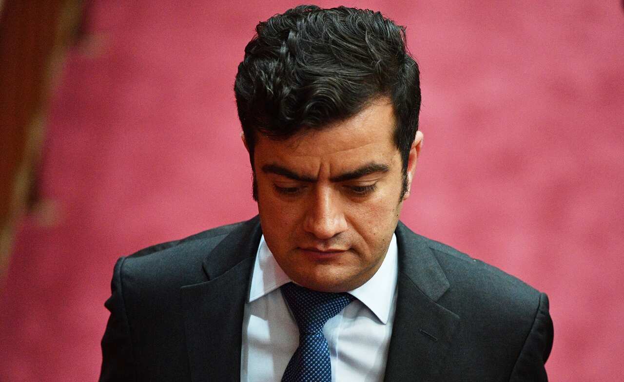 Labor Senator Sam Dastyari leaves after Question Time in the Senate chamber at Parliament House in Canberra, Tuesday, December 5, 2017. (AAP Image/Mick Tsikas) NO ARCHIVING