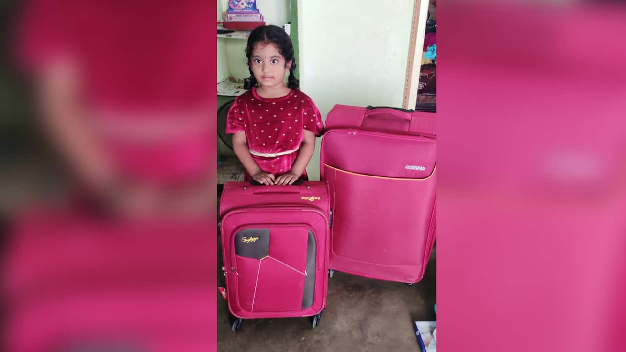 Five-year-old Heshvitha Mupparaju had been ready with bags packed to return before flights were cancelled. 