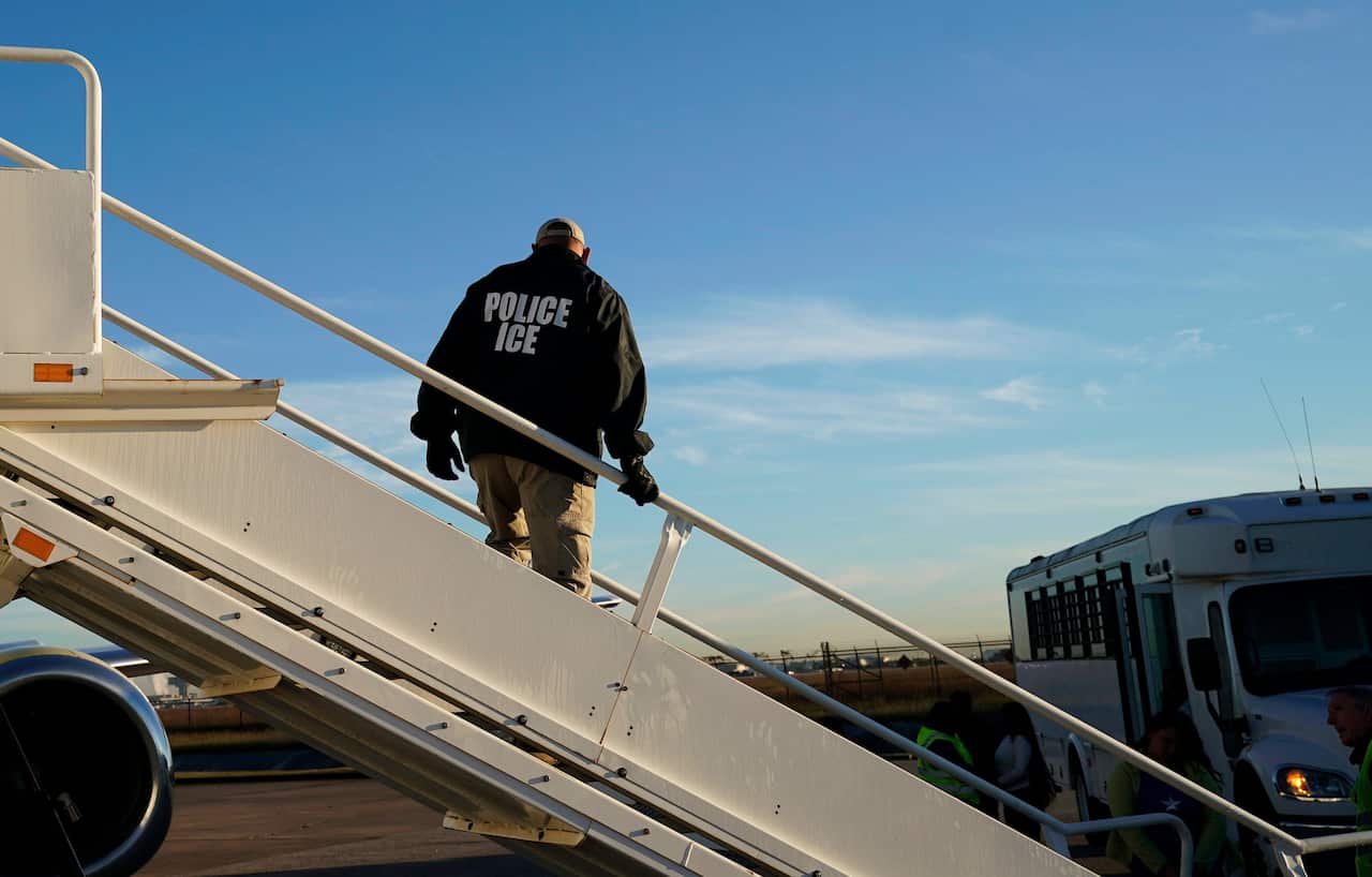An Immigration and Customs Enforcement agent as deportations were being carried out in November in Houston.