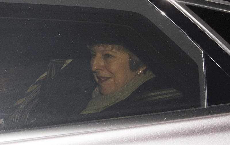 Theresa May leaves the Houses of Parliament after being defeated in The Meaningful Vote on Brexit EU Withdrawal Agreement in London.