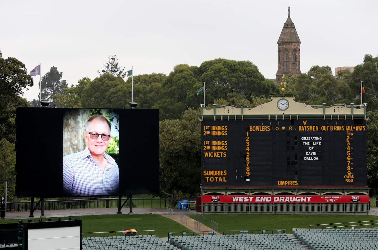 Gavin Dallow's photo and name on the scoreboard at Adelaide Oval. 