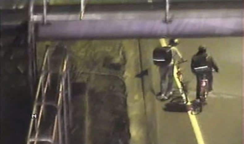 Two food delivery couriers are seen in Sydney's tunnel system, where it is illegal to cycle.  