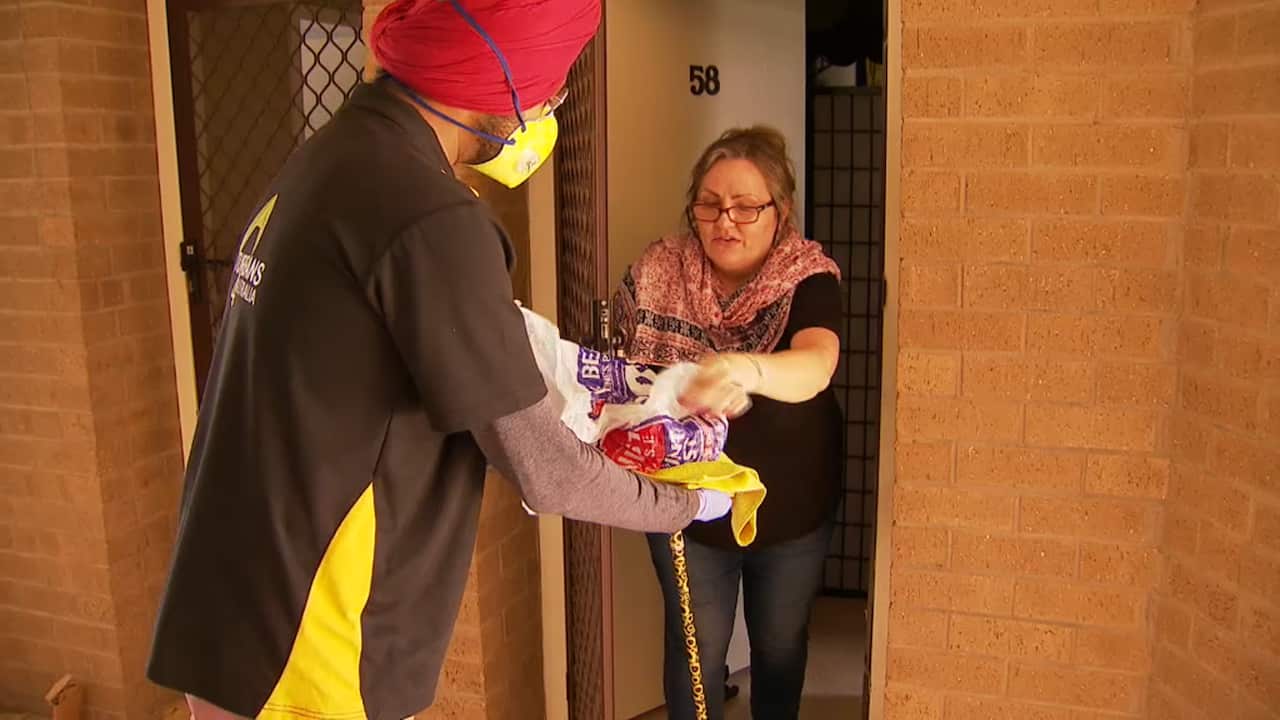 Marilouise receives her meal from Turbans 4 Australia. 