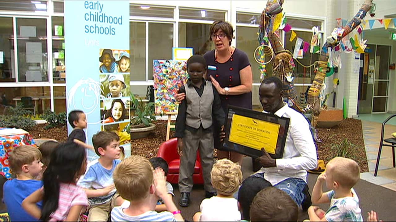 Deng Adut meeting the children (SBS)