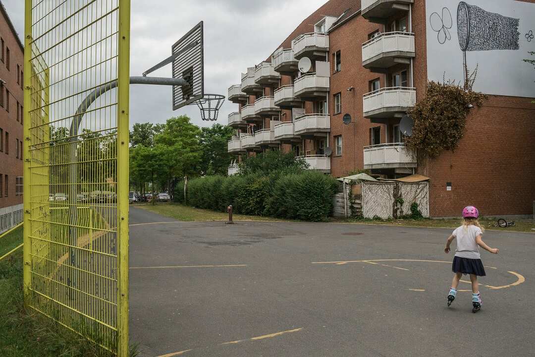 A child plays in Mjolnerparken, a housing project that is classified as a ghetto by the Danish government, in Copenhagen.