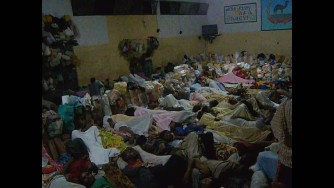 Night time inside a cramped Eritrean detention centre. 