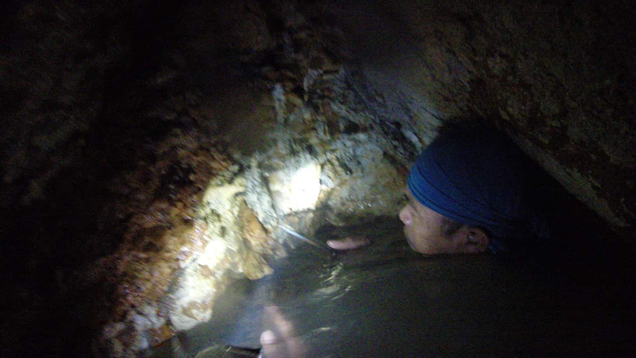 Once underground, the miners work in confined spaces chipping at the rock for any specks of gold.