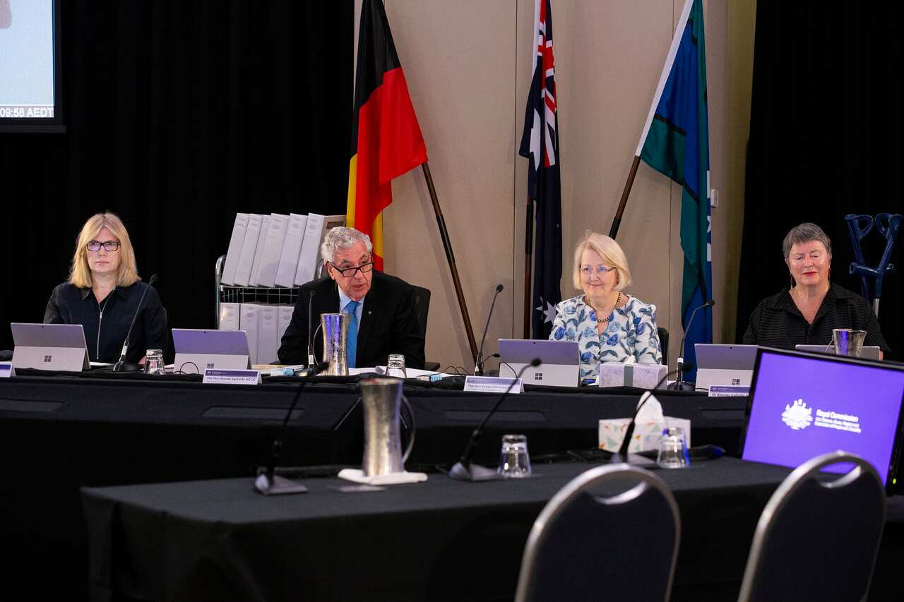 Commissioners Barbara Bennett, chair Ronald Sackville QC, Roslyn Atkinson and Professor Rhonda Galbally.