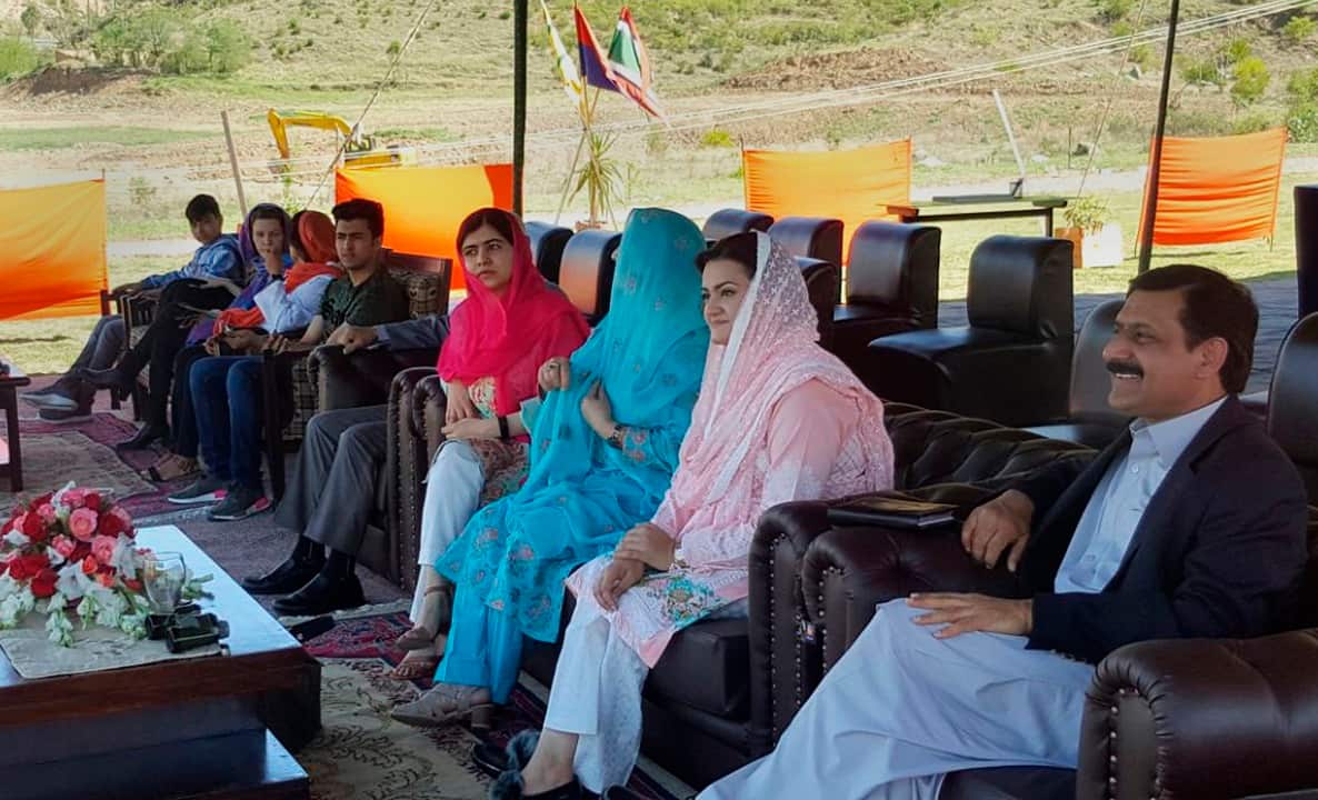 Pakistan's Nobel Peace Prize winner Malala Yousafzai sits with her family.